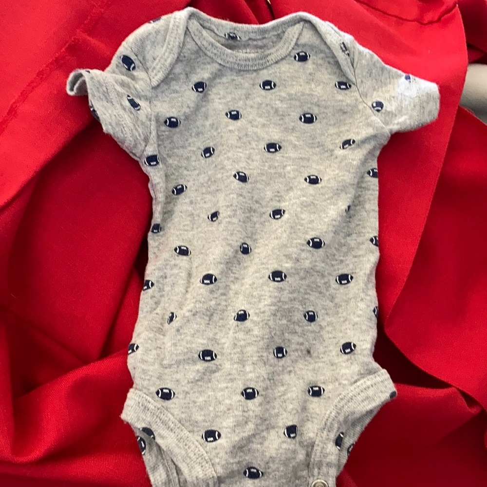 Carter’s newborn football one piece